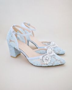 Crochet Lace Wedding Shoes Collection. Classic and refined almond toe crochet lace with added pearls applique. Choose from regular ankle straps or pearl ankle straps and tie silky ribbon bow at the back for a secure fitting. The luminous pearls makes this a classy and elegant bridal shoes.DETAILS:HEELS: 2.75 inchesUPPER: Synthetic upper and liningMATERIALS: Manmade outsoleORIGIN: Imported Elegant Lace Wedding Shoes With Ankle Strap, Spring Wedding Lace Shoes, Spring Wedding Shoes With Ankle Strap In Lace, Lace Ankle Strap Wedding Shoes, Spring Wedding Shoes With Lace And Ankle Strap, Spring Wedding Shoes With Lace And Round Toe, Spring Wedding Lace Shoes With Round Toe, Elegant Heels For Spring Reception, Lace Low Heel Wedding Shoes