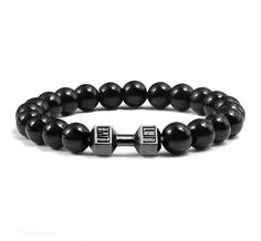 -Application: weighted bracelet length of 20CM elastic band with 8MM high-quality round Onyx stones, designed to relieve pressure, meditation, yoga, and essential oil diffusion. -This striking accessory features high-quality Black Onyx beads, exuding a rich, deep black hue that evokes a sense of power, sophistication, and confidence. -As a powerful grounding stone, it promotes emotional stability, mental clarity, and focus, while protecting negative energies and psychic attacks. -Black Onyx is also believed to enhance inner strength, resilience, and self-discipline, empowering you to face life's challenges with courage and grace. -Embrace the potent energy and captivating elegance of the Black Onyx Bracelet, and experience the enhanced protection, inner strength, and confidence it brings t Luxury Onyx Gemstone Bead Bracelets, Luxury Onyx Gemstone Beads Bracelet, Spiritual Onyx Bracelet, Spiritual Black Onyx Crystal Bracelet, Luxury 8mm Onyx Beads Jewelry, Psychic Attack, Black Onyx Bracelet, Onyx Bracelet, Onyx Bead