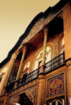 an ornate building with many windows and balconies