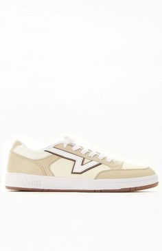 Step into a comfortable 80s-inspired style with the Vans Beige Lowland ComfyCush Leather Sneakers, featuring a distinctive 'Flying V' logo. This archival Vans silhouette from the 80s boasts a slim profile and a modernized ComfyCush outsole for enhanced comfort. Originally created for tennis in the early 80s, this low-top design retains its classic appearance while introducing the iconic 'Flying V' Vans logo for a touch of excitement..PLEASE NOTE: This shoe is offered in men's sizes; please consu Beige Logo Sneakers For Streetwear, Retro Vans Leather Skate Shoes, Retro Leather Vans Skate Shoes, Retro Beige Sneakers For Streetwear, Vans Beige Sneakers For Streetwear, Retro Synthetic Skate Shoes With Cushioned Footbed, Happy Returns, Flying V, Vans Logo