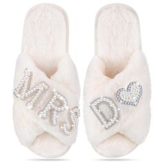 PRICES MAY VARY. Letters Bridal Slippers: our wedding slippers are designed in a variety of letter styles, you can choose your personalized initial slippers, and they are suitable for bridal shower, bridesmaid party, bridal party, also ideal for sleeping, bathing and leisure, comfortable and wear resistant, let you wear the feeling of clouds, white fluff and shining rhinestones can easily match your morning gown, let you shine at any time One Size Fits Most: the bride slippers measure about 9.65 Wedding Slippers For Bride, Pearl Slippers, Slippers Wedding, Letter Styles, Bridesmaid Slippers, Bridal Party Pajamas, Bridal Slippers, Bride Slippers, Bridal Shower Gifts For Bride