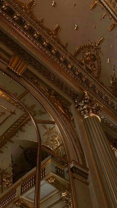 an ornately decorated ceiling in a building