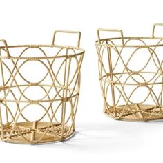 two baskets with handles made out of bamboo