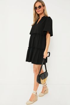 The Black Crepe Crawford Dress is exactly what we have been searching for — that perfect warm weather piece that you can throw on for morning cappuccinos and wear until cocktail hour. Featuring oversized flutter sleeves, ruffle detailing on the neckline and skirt, and a swing silhouette in a timeless color, this mini is the most flattering and flirty frock. Effortlessly whisking you from work to play, pair with sneakers and sunnies for a casual look then switch to wedges and statement earrings f Cocktail Hour, Flutter Sleeves, Mini Me, Flutter Sleeve, Warm Weather, Statement Earrings, The Black, Casual Looks, Sunnies