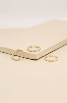 Scalloped edges create a unified theme among this trio of sophisticated, stackable rings plated in 18-karat gold. Set of three rings 18k-gold plate/cubic zirconia Imported Rings In Gold, Ring Plate, Stacking Ring Set, Three Rings, Gold Ring Stack, Bling Rings, Plated Ring, Gold Plated Rings, Keep Jewelry