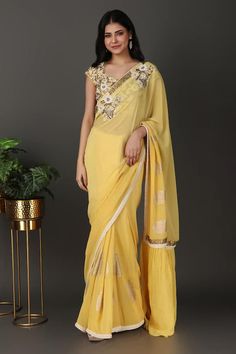 Yellow saree with floral, beads and sequins hand embroidered borders. Comes with a padded blouse and a petticoat. - Aza Fashions Embroidered And Embellished Fabric For Designer Wear During Navratri, Transitional Bollywood Style Embellished Pre-draped Saree, Anarkali Style Embellished Pre-draped Saree In Tissue Silk, Embellished Tissue Silk Saree Set, Traditional Embellished Tissue Silk Pre-draped Saree, Traditional Embellished Pre-draped Saree For Festive Season, Festive Embellished Art Silk Saree, Embellished Art Silk Saree For Designer Wear, Designer Wear Embellished Art Silk Saree