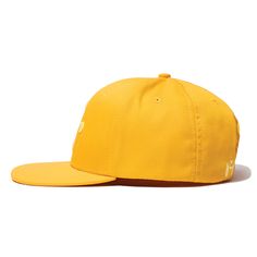 The Gild is a classic six-panel, baseball-style cap in mustard with raised embroidery detail in light yellow. All March Caps feature top eyelets and an adjustable snap-back closure. Each cap comes with a hand-numbered card signed by the designer. Adjustable Yellow Hat, Yellow Cotton Trucker Hat, Yellow Cotton Snapback Baseball Cap, Adjustable Yellow Fitted Hat With Curved Brim, Yellow Baseball Cap With Curved Brim, Yellow Adjustable Flat Bill Snapback Hat, Gold Snapback Hat With Flat Brim For Streetwear, Yellow Adjustable Fitted Cap, Gold Baseball Cap For Streetwear