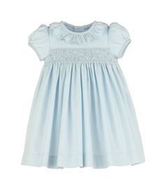 The Casero & Associates Silverstone Flower Smock Dress in blue is the perfect dress for your little girl. With its delicate smocked design and charming ruffle collar, your baby or toddler will be the epitome of elegance. Make them feel like a true princess in this beautiful blue dress. Cotton Smocked Dress With Ruffles For Baptism, Elegant Smocked Ruffle Dress For Baptism, Elegant Smocked Dress With Smocked Cuffs For Baptism, Blue Spring Dress With Ruffled Collar, Fitted Dress With Smocked Back And Ruffled Collar, Spring Classic Smocked Dress With Smocked Bodice, Classic Smocked Dress With Smocked Bodice For Spring, Classic Spring Smocked Dress With Smocked Cuffs, Fitted Blue Smocked Dress With Ruffles