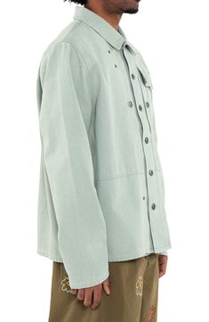 Add a workwear twist to your outerwear wardrobe with a cotton-canvas shirt-jacket cut in a slightly oversized fit and detailed with rivet-style hardware. 27 1/2" length (size Medium) Front button closure Spread collar Chest button-flap patch pocket 100% cotton Machine wash, tumble dry Imported Cotton Outerwear With Snap Buttons, Cotton Snap Button-up Shacket, Everyday Cotton Outerwear With Buttons, Long Sleeve Cotton Shacket With Buttons, Cotton Long Sleeve Shacket With Buttons, Oversized Cotton Utility Jacket, Utility Cotton Outerwear With Snap Buttons, Cotton Utility Outerwear With Snap Buttons, Utility Style Cotton Outerwear With Snap Buttons