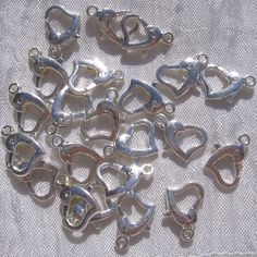 Lobster clasps, 4 clasps, heart clasps, 14x9mm clasp, silver lobster clasp, for chain necklace bracelet, jewelry creation, M4 Set of 4 silver leaf whitened lobster clasps Shape: Heart Color: light silver Dimensions: 14x9mm Number of carabiners in a set: 4 pieces Compatible rings are sold in the shop under ref A56 (5mm), A55 (4mm) For your costume jewelry: bracelets, necklaces, chains, etc. Don't forget to look at our other items for sale. You may find your "rare pearl" there. Lots of beads, find Rare Pearls, Bar Items, Bracelet Jewelry, Jewelry Creation, Silver Leaf, Necklace Bracelet, Color Light, Wedding Shop, Favorite Things List