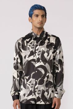 Full sleeve printed shirt in an abstract design Fit: Regular fit Color: blackFabric: Modal satin White Fitted Silk Shirt, Fitted White Silk Shirt, Designer Patterned Printed Shirt, Designer Formal Printed Tops, Designer Printed Tops For Formal Occasions, Designer Silk Shirt For Party, Designer Silk Printed Shirt, Elegant Formal Tops With Graphic Print, Elegant Tops With Graphic Print For Formal Occasions