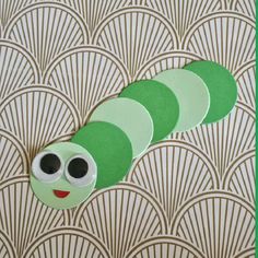 the very hungry caterpillar craft for kids to make it looks like he is ready to eat