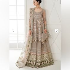 Brand New! Designer: Baroque Size Xl Features A Full Embroidered Net Body, Sleeves, And Patches On The Front, Back, And Sleeves, Plus An Organza Printed Dupatta With Embroidered Net Dupatta Patches And Embroidered Trouser Patches. The Trousers Are Made Of Silk And Embroidered. Ivory Dupatta, Organza Printed Dupatta, Walima Dresses Pakistani, Bridal Lehenga Indian, Pakistani Mehndi Dress, Party Wear Frocks, Net Sleeves, Wedding Dresses Pakistani, Walima Dress