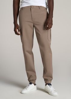 American-Tall-Men-Cotton-Cargo-Jogger-Dark-Sand-front Khaki Stretch Tapered Leg Cargo Pants, Stretch Khaki Tapered Leg Cargo Pants, Stretch Tapered Leg Khaki Cargo Pants, Elevated Casual Straight Leg Joggers With Pockets, Straight Leg Joggers With Pockets For Elevated Casual, Elevated Casual Tapered Leg Cargo Pants, Stretch Cargo Style Tapered Leg Bottoms, Stretch Tapered Leg Cargo Bottoms, Stretch Full-length Chinos With Pockets