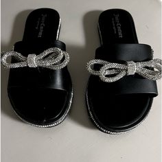 Brand New Without Tag - Size 7 Woman's Juicy Couture Rhinestone Slides In Excellent Condition. Black Patent With Rhinestone Bows. Black Rhinestone Sandals With Round Toe, Black Rhinestone Round Toe Sandals, Casual Black Sandals With Rhinestones, Trendy Black Sandals With Rhinestones, Rhinestone Slides, Juicy Couture Shoes, Bow Women, Couture Shoes, Juicy Couture Black