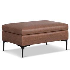 a brown leather ottoman sitting on top of a wooden frame footstool in front of a white background