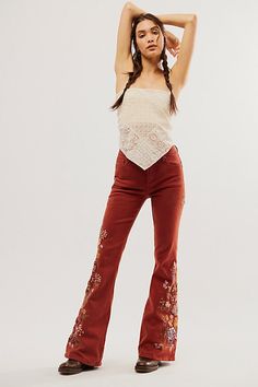 So special in a vintage-inspired design, these classic denim jeans from Driftwood are featured in a high-rise, flare silhouette with exaggerated floral embroidery at sides for added dimension. * Zip-fly and button closure * Five pocket design * Soft, stretch denim | Driftwood Farrah Embroide Flare Jeans at Free People in Red, Size: 26 Unique Rave Outfits, All Jeans, Red Fits, Embroidered Jeans, Vintage Inspired Design, Bottom Clothes, Pocket Design, Boho Outfits, Floral Embroidery