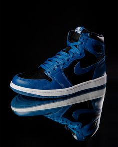 The sneakers deliver a modified version of the model’s inaugural “Royal Blue” colorway from 1985. Synthetic leather covers the entirety of the upper, with panels peeking out at the toe box, mid-foot and collar areas boasting a pitch-“Black” arrangement. Tag us in your OOTD pictures featuring this quintessential sneaker with #findyourpair ! Air Jordan 1 Retro High Og, Marina Blue, Air Jordan 1 Retro, Jordan 1 Retro, Jordan 1 Retro High, Nike Air Jordan, Nike Air Force Sneaker, Leather Cover, Jordan 1