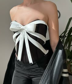 Black & White Bow Corset Lirika Matoshi Bow Corset, Iron Maiden Nails, Fitted Party Tops With Ribbon, White Fitted Top With Ribbon, Fitted White Top With Ribbon, Elegant White Tops With Ribbon, Elegant White Top With Ribbon, White Organza Evening Top, Bow Corset