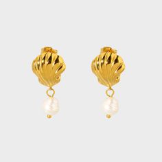 Experience the beauty of the ocean with our stunning 18K Seashell Freshwater Pearl Earrings. These earrings feature delicate seashell pendants and lustrous freshwater pearls, creating a fashionable yet timeless look. Crafted with high-quality stainless steel, these earrings are perfect for any beach lover or fashion enthusiast. Elevate your style with our 18K Seashell Freshwater Pearl Earrings today! Seashell Pendants, Freshwater Pearl Earrings, Fashion Enthusiast, Beach Lover, Freshwater Pearls Earrings, Beach Lovers, Pearl Drop, The Ocean, Fresh Water