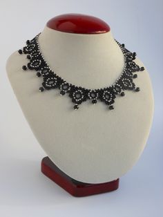 Black necklaces for women Beaded necklace Beaded jewelry necklace Weaving beads necklace Handmade choker collar necklace  This beautiful necklace handmade from quality Czech materials. The necklace is very flexible and convenient. In a necklace clasp used to regulate the length of the necklace. The length of the necklace around the circumference 40-42 cm. If there is a need can make for your size. Custom orders welcome. Let me know if you want a something special that yon not find yet. Anyway thank you for interest in to my work. Be beautiful. :) And finally please look at some of this simple advice which help you care for your beaded necklace: 1) Better not to bend and twist necklace. Best to store it in a separate envelope or casket away from sunlight and moisture. 2) To clean your neckl Elegant Beaded Choker Necklace With Spacer Beads, Black Beads For Jewelry Making Choker, Elegant Choker With Colorful Round Beads, Elegant Black Choker With Colorful Beads, Weaving Beads, Black Necklaces, Handmade Chokers, Beaded Jewelry Necklaces, Choker Collar Necklace