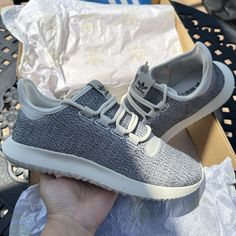 Elevate Your Active And Casual Wear With These Stylish And Comfortable Adidas Tubular Shadow Sneakers. Designed For Women, These Athletic Shoes Come In A Trendy Off-White Color And A Standard Shoe Width, Making Them Perfect For Walking, School, Running, And Jogging. The Lace-Up Closure Ensures A Secure And Customized Fit, While The Low-Top Shoe Shaft Style Adds A Touch Of Sophistication To Your Outfits. Made With Synthetic Upper Material And A Rubber Outsole Material, These Adidas Tubular Shadow Casual Gray Slip-on Running Shoes, Casual Gray Running Shoes With Round Toe, Comfortable Running Shoes With Textured Sole And Round Toe, Casual Running Shoes With Textured Sole And Slip-on Style, Comfortable Running Shoes With Textured Sole, Casual Ankle-high Sneakers With Textured Sole, Casual Adidas Sneakers With Boost Midsole, Comfortable Gray Running Shoes With Round Toe, White Sole Synthetic Running Shoes