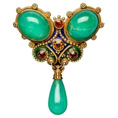 This fine piece of Art Nouveau jewellery has the inscription September 30th 1904 engraved on the reverse. Two oval cabochon chrysoprase, a chrysoprase drop and four round cut citrines in yellow, light and deep orange are mounted in 14 karat gold . The brooch is decorated with blue and green enamel, applied golden flowers and fine beading enhance the design. Antique Multi-stone Brooches For Formal Occasions, Art Nouveau Cabochon Wedding Brooches, Art Nouveau Cabochon Brooches For Weddings, Collectible Art Nouveau Hallmarked Brooch, Vintage Pendant Brooches With Cabochon, Antique Pendant Brooch With Cabochon, Antique Green Gemstone Brooches, Victorian Pendant Brooches With Cabochon, Antique Cabochon Brooches For Anniversary