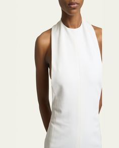 Jacquemus "Favola" solid dress    Halter neckline; lowcut back    Sleeveless    Midi length    Aline silhouette    Back zip    Viscose/nylon/polyamide/elastane    Elastane/nylon lining    Dry clean    Made in France Backless Elastane Dress With Back Zipper, Backless Dress With Back Zipper In Elastane, Structured Sleeveless Party Dress, Fitted Sleeveless Backless Dress With Back Zipper, Fitted Chic Maxi Dress With Closed Back, Chic Fitted Maxi Dress With Closed Back, Sleeveless Stretch Elastane Backless Dress, Sleeveless Summer Dresses With Minimal Stretch, Stretch Elastane Sleeveless Backless Dress