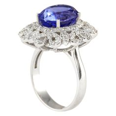 Stamped: 14K White GoldTotal Ring Weight: 8.5 GramsRing Length: N/ARing Width: N/AGemstone Weight: Total Natural Tanzanite Weight is 5.97 Carat (Measures: 12.00x9.60 mm)Color: BlueDiamond Weight: Total Natural Diamond Weight is 1.00 CaratColor: F-G, Clarity: VS2-SI1Face Measures: 22.55x19.95 mmSku: [704102W] Oval Diamond Gemstones For Formal Occasions, Formal Oval Diamond Gemstones, Oval Center Stone Gemstones For Formal Occasions, Oval Gemstones With Halo Setting For Formal Occasions, Oval Gemstones With Prong Setting For Formal Occasions, Oval Gia Certified Sapphire Ring For Formal Occasions, Formal Oval Gia Certified Sapphire Ring, Formal Oval Sapphire Ring Gia Certified, Gia Certified Oval Sapphire Ring For Formal Occasions