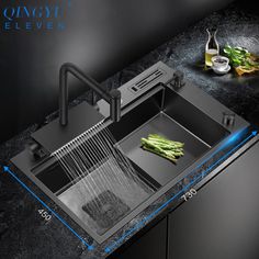 an image of a kitchen sink with the strainer open and asparagus in it