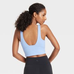 Add cool, comfy style to your fitness attire with this High-Neck Longline Bra from JoyLab™. Made from lightweight interlock fabric with added stretch, this longline bra offers a comfortable fit that moves with you, and the opaque lining provides confident wear. Designed with removable padding for customizable coverage, pair it with leggings, bike shorts or joggers to complete the versatile athletic look. JoyLab™: A movement that’s always in motion. V-neck Elastane Activewear For Workout, Athleisure Seamless Bra, V-neck Athleisure Top With Light Support, Compressive Sleeveless Athleisure Bra, Athleisure V-neck Top With Light Support, Functional Medium Support Sports Bra For Loungewear, V-neck Yoga Activewear With Light Support, Seamless V-neck Activewear For Pilates, Seamless Athleisure Bra