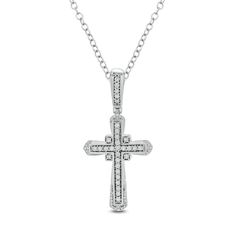 He'll cherish the symbolism of this vintage-inspired diamond cross pendant. Fashioned in sterling silver, this choice features a shimmering diamond-adorned cross with a quad of diamonds nestled around the center design. Intricate vintage detailing and additional diamonds along the bail complete the design. Captivating with 1/6 ct. t.w. of diamonds and a brilliant buffed luster, this pendant suspends along an 18.0-inch cable chain that secures with a spring-ring clasp. Timeless Sterling Silver Cross Jewelry, Classic Diamond Pendant Cross Necklace, Timeless White Gold Cross Jewelry, Classic Diamond Cut Cross Necklace, Classic Diamond Cross Necklace For Formal Occasions, Classic Vvs Clarity Diamond Cross Pendant Necklace, Classic Diamond White Cross Necklace, Classic Cross Diamond Cut Necklace, Timeless Diamond Cross Pendant Jewelry