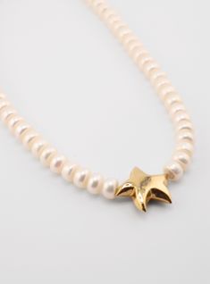 Handcrafted Starfish Pearls Necklace, embodying elegance and artistry. Drape yourself in this luxurious accessory, adorned with lustrous pearls and a delicate starfish pendant. Every piece is unique They are made by hand in Florida. Available in 16" and 18". Both sizes feature a 2" extension chain.” long Starfish-shaped Necklace With Pearl Charm For Gift, Elegant Starfish Charm Star Necklace, Elegant Starfish Charm Necklace, Star-shaped Pearl Charm Jewelry, Elegant Star-shaped Necklace With Starfish Charm, Star-shaped Pearl Jewelry For Gift, Elegant Starfish-shaped Pearl Charm Jewelry, Pearl Jewelry With Star Charm As A Gift, Pearl Jewelry With Star Charm For Gift