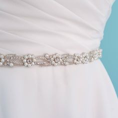 This is  beautiful  skinny pearl and Swarovski crystal bridal sash belt. The floral motif of the jeweled belt goes well with almost any wedding dress. The embellished part is made of silver seed beads, Swarovski crystals and pearls and it 24" inches long and .6 inches wide. If you are looking for a thin bridal sash to add a little sparkle around you waist, this is it! There are several sash options, but with the new Etsy software, it is hard to list them. The sash can be made of double faced Swi Belt For Dress, Dress Belts, Bridal Sash Belt, Wedding Dress Belt, Diamond Dress, Wedding Sash Belt, Wedding Sash, Bridal Sash, Wedding Belts