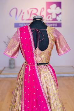 This elegant Gold and Light Pink Border Kanjivaram tissue silk Lehenga features an embroidered dupatta for a touch of sophistication. Perfect for any special occasion, this garment is sure to make an impression. Brocade Pre-draped Saree With Resham Embroidery, Festive Brocade Pre-draped Saree With Dupatta, Semi-stitched Tissue Silk Traditional Wear, Semi-stitched Raw Silk Choli With Zari Weaving, Festive Resham Embroidered Brocade Choli, Brocade Choli With Zari Work For Navratri, Brocade Saree Sets With Resham Embroidery, Semi-stitched Brocade Sets With Zari Work, Bollywood Style Brocade Sets With Zari Work