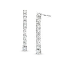 Take your look to the next stylish level when you wear these certified lab-created diamond graduated drop earrings. Crafted in cool 10K white gold Each linear drop showcases certified lab-created diamonds graduating from smallest at the top to the largest 1/10 ct. stone at the base. Each lab-created diamond in this 1 ct. t.w. design boasts a color rank of I and clarity of I1. Includes certification card These post earrings secure comfortably with friction backs. White Diamond Linear Earrings With Prong Setting, White Prong Setting Linear Earrings Fine Jewelry, Fine Jewelry Linear Earrings With Prong Setting In White, White Brilliant Cut Drop Earrings, White Linear Earrings With Prong Setting, Classic Diamond White Linear Earrings For Anniversary, Classic Linear Earrings In Diamond White For Anniversary, Classic Brilliant Cut Drop Earrings, White Cubic Zirconia Linear Earrings With Prong Setting