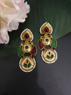 Length around 2.5 inches Multicolor Kundan Bridal Earrings With Intricate Design, Multicolor Temple Jewelry Bridal Earrings With Intricate Design, Elegant Dual-tone Metal Earrings, Heavy Chandbali Earrings In Brass, Heavy Chandbali Brass Earrings, Heavy Bollywood Brass Bridal Earrings, Heavy Brass Bollywood Bridal Earrings, Bollywood Style Heavy Brass Bridal Earrings, Temple Jewelry Chandbali Bridal Earrings In Brass