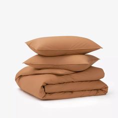 four pillows stacked on top of each other