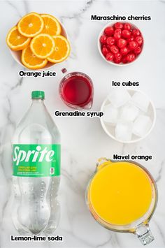 ingredients to make an orange juice recipe on a marble counter top, including cranberries, ice cubes, and lemon - lime soda