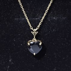 Product Details Experience the elegance of simplicity with this Created Black Diamond Heart Necklace, symbolizing courage and unshakable willpower in life. Adorned with a classic heart-shaped Created Black Diamond in a prong setting, this Created Black Diamond necklace is the perfect accessory for your wedding anniversary or any special occasion. Product Information SKU SHP-PENDANT042168483 Weight 3.00 gm (Approximate) LAB CREATED BLACK DIAMOND INFORMATION No.of Stones 1 Pieces Total Weight 2.40 Black Diamond Necklace, Black Diamond Solitaire, Diamond Heart Necklace, Black Diamond Jewelry, Solitaire Necklace, Heart Necklace Diamond, Diamond Solitaire Necklace, Solitaire Necklaces, Diamond Heart