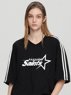 This sporty T-shirt is detailed with 90's style graphic print and stripe tapes. It is cut from 20's single cotton jersey that makes you feel comfortable.- Ribbed V-neck- Graphic print at front - Double stripe tapes at sleeves- Point logo label at hem- Loose fit- Unisex wear- Tentar and tumble finish to minimize distortion after wash Cheap Adidas Tops With Logo Print, College V-neck Graphic Print T-shirt, Sporty Striped V-neck Top, Black T-shirt With Contrast Stripes For Streetwear, Sporty Striped T-shirt For Streetwear, Sporty Black T-shirt With Contrast Stripes, Retro V-neck T-shirt With Letter Print, Graphic Print V-neck Top For Sports Events, V-neck Top With Graphic Print For Sports Season