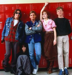 the cast of friends posing in front of lockers