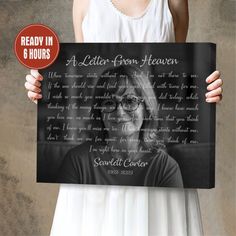 a woman holding up a black and white photo with the words'a letter from heaven '