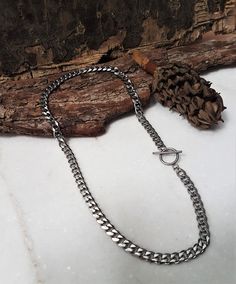 "Womens dark silver stainless steel cuban link chain necklace, sturdy curb chain necklace, unisex hipster style chain necklace, women's gift Welcome to my shop! ✈️ DHL EXPRESS SHIPPING AVAILABLE, 1-3 BUSINESS DAYS DELIVERY! ✔️ PLEASE MAKE SURE TO SELECT IT, RIGHT BEFORE YOUR PURCHASE! ❗️ ❗️ DON'T FORGET TO ADD YOUR CELL # AT THE \"NOTE TO SELLER\" SECTION IF YOU CHOOSE DHL! BY FILLING YOUR CELL NUMBER YOU EARN THE BENEFIT TO CHOOSE BETWEEN 6 DIFFERENT DELIVERY OPTIONS! INSTRUCTIONS WILL BE SENT Silver Curb Chain Choker Necklace, Trendy Silver Curb Chain Necklace, Silver Choker Necklace With Curb Chain, Trendy Silver Necklace With Curb Chain, Metal Cuban Link Chain Necklace, Metal Curb Chain Jewelry, Metal Curb Chain Link Jewelry, Gunmetal Chain Necklace As Gift, Black Stainless Steel Necklaces With Chunky Chain