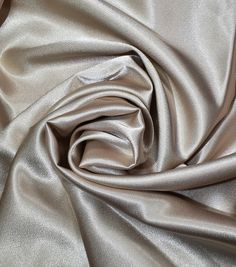 a close up shot of a silver fabric