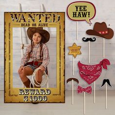 an old western photo frame with cowboy hats and mustaches on it next to some props