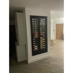 a wine rack in the corner of a room