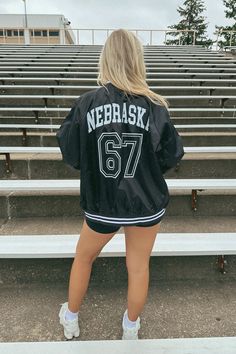 Get ready for game day with this new FSB exclusive- the Nebraska 1867 Varsity Jacket! Available in small-xl Model is wearing size XL Team-colored Outerwear With Team Name For Game Day, Game Day Varsity Jacket With Team Name, Game Day Long Sleeve Varsity Jacket With Team Name, Varsity Jacket With Team Name For Game Day, Team-colored Varsity Outerwear With Team Name, Team-colored Outerwear For Game Day And Sports Season, Team-colored Outerwear With Team Name For Sports Season, Team-colored Collegiate Outerwear For Sports Events, Team-colored Outerwear For Game Day With Team Spirit