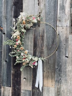 Gold metal hoop wreath with dried flowers. greenery and textures. Excellent gift or home decor item for yourself! All items were grown and dried by us in Medford Oregon. The hoop itself is 18" in diameter. Metal Hoop Wreath, Medford Oregon, Dried Flower Wreath, Dried Wreath, Dried Flower Wreaths, Floral Wreaths, Dried Flower, Flower Wreath, Gold Hoop