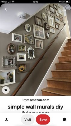 a staircase with pictures on the wall and an advertizer below it that reads, from amazon com simple wall murals diy visit